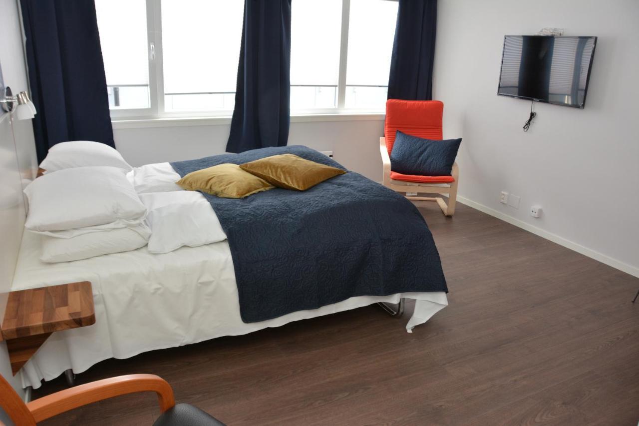 Husnes Sentrum Hotell Extérieur photo